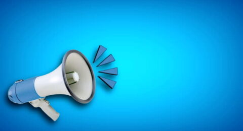 white megaphone on colored background