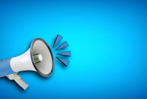 white megaphone on colored background